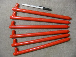 A six pack of 12" long Orange metal tent pegs, tent anchors or stakes