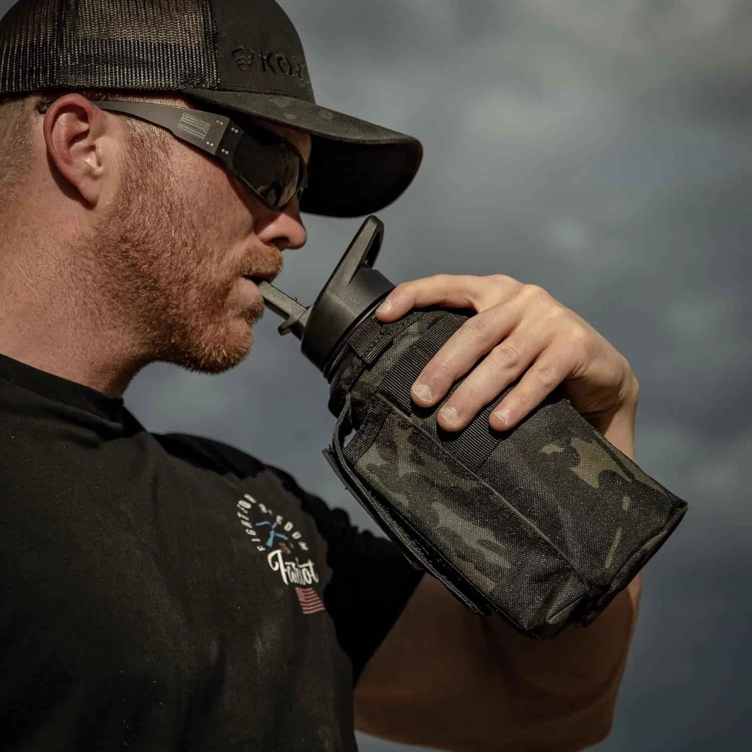 Iron Infidel Battle Bottle - 32 Oz Insulated Water Bottle with Straw Lid & Chug Cap, Stainless Steel Metal Tactical Flask With Rugged, Removable Sleeve for Keys & Phone or Wallet (Black Camo 1 Liter)